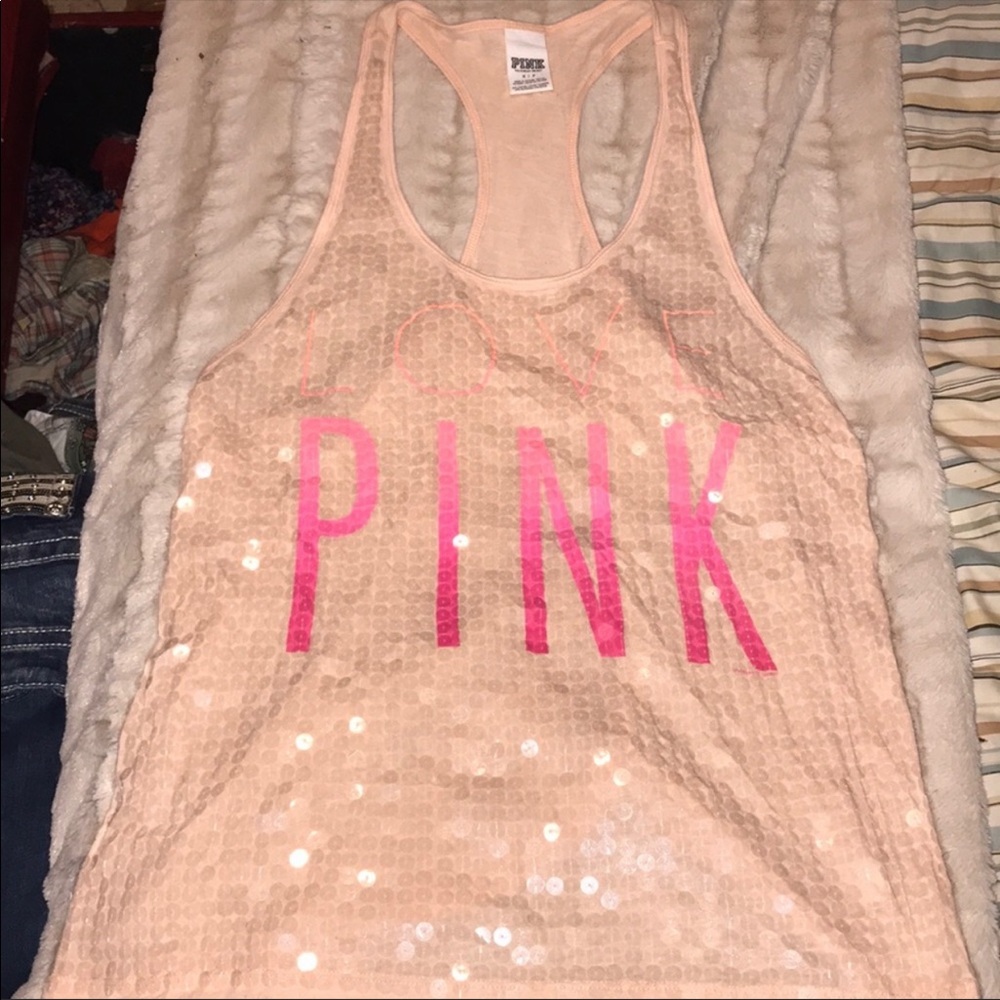 Pink tank size small. Like new